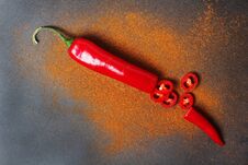 Red Chili Pepper At Dark Background With Paprika Powder Royalty Free Stock Photo