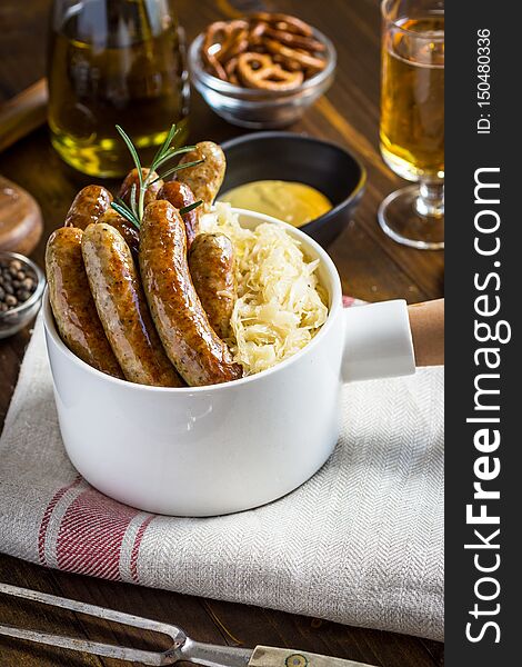 Traditional German Sausages With Cabbage Salad, Mustard And Beer