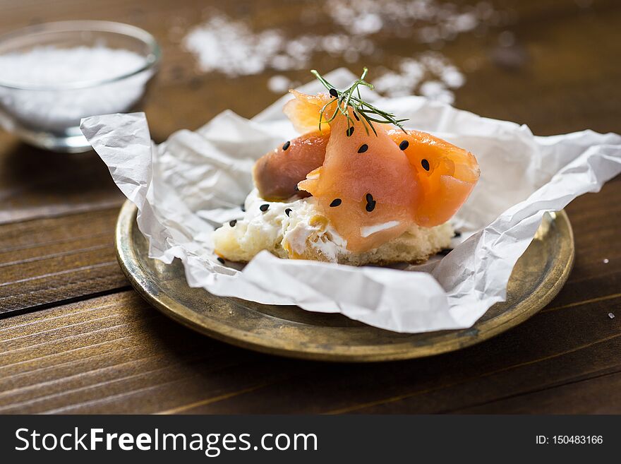 Fresh Pretzel with Smoked Salmon, Cream Cheese, Fresh Dill, Black Sesame and Lime