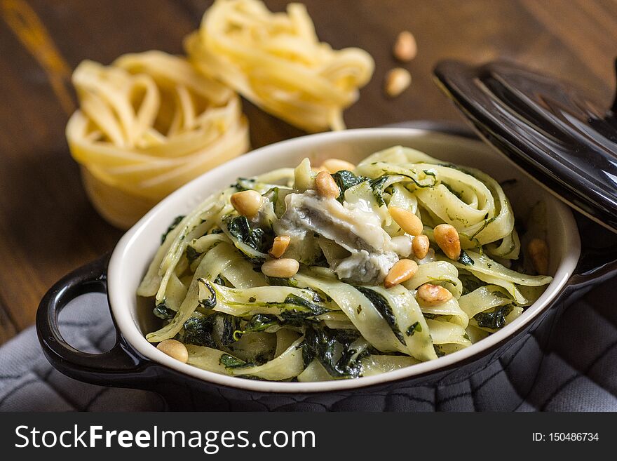 Italian Tagliatelle with Spinach, Pine Nuts and Gorgonzola Cheese