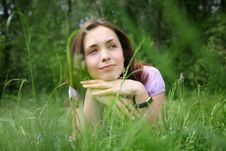 Girl On Grass Royalty Free Stock Photo