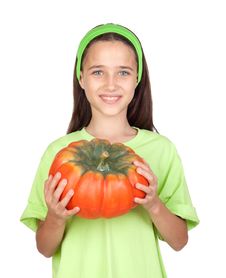 Happy Girl In Halloween With A Big Pumpkin Royalty Free Stock Image Happy Girl In Halloween With A Big Pumpkin Royalty Free Stock Image