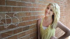 Girl Standing Next To Brick Wall Royalty Free Stock Photography Girl Standing Next To Brick Wall Royalty Free Stock Photography