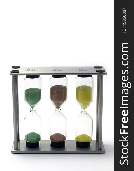 3-4-5-minute hour-glasses (egg-timers) on isolated white