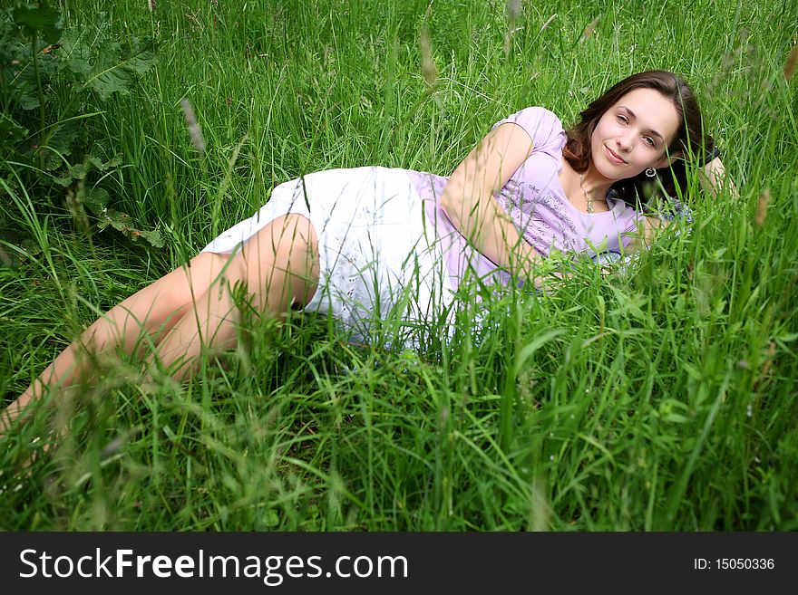 On a sunny summer day, very pleasant to lie on the grass. On a sunny summer day, very pleasant to lie on the grass