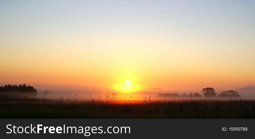 Morning fog stretched along the layers of the earth. Sunrise. Morning fog stretched along the layers of the earth. Sunrise.