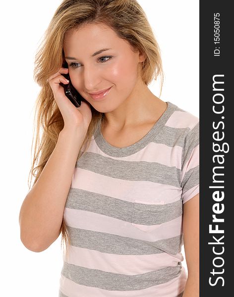 Young female talking by telephone and smiling