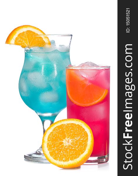 Blue and red cocktails with fruits on white background