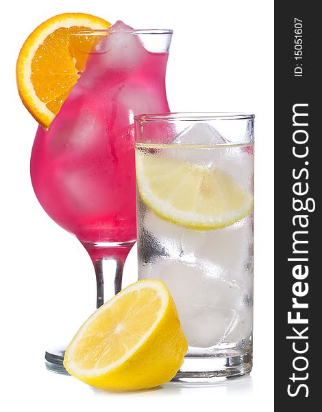 Red cocktail and lemonade with lemon on white background