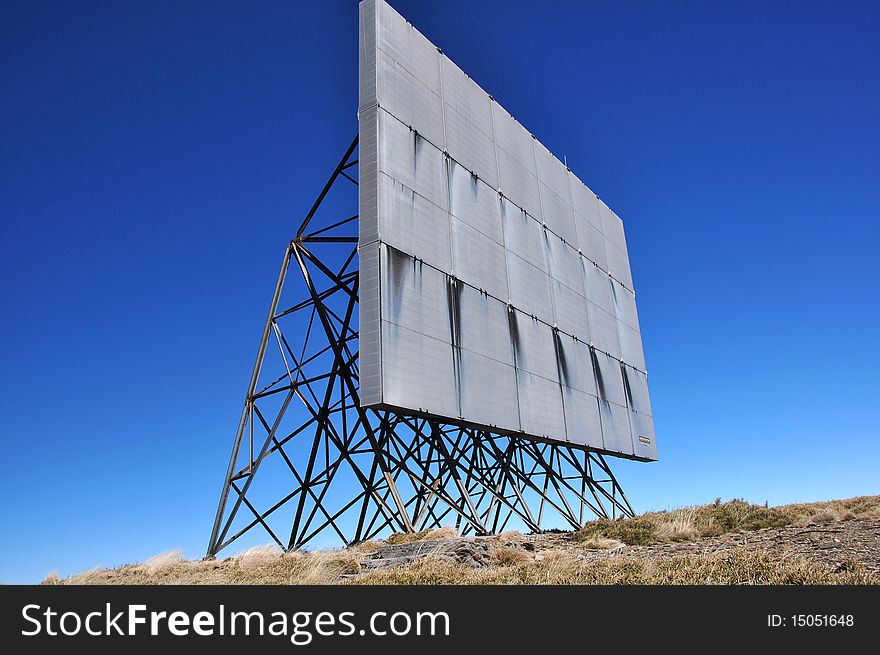 Ad billboard on a mountain peak