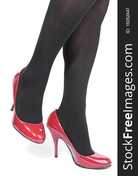 woman  legs tights  with red heels over white