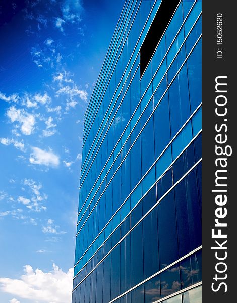 Office building against beautiful blue sky