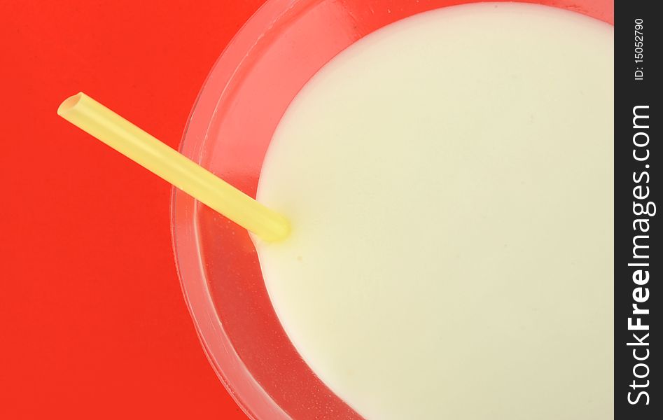 Soybean milk on red background