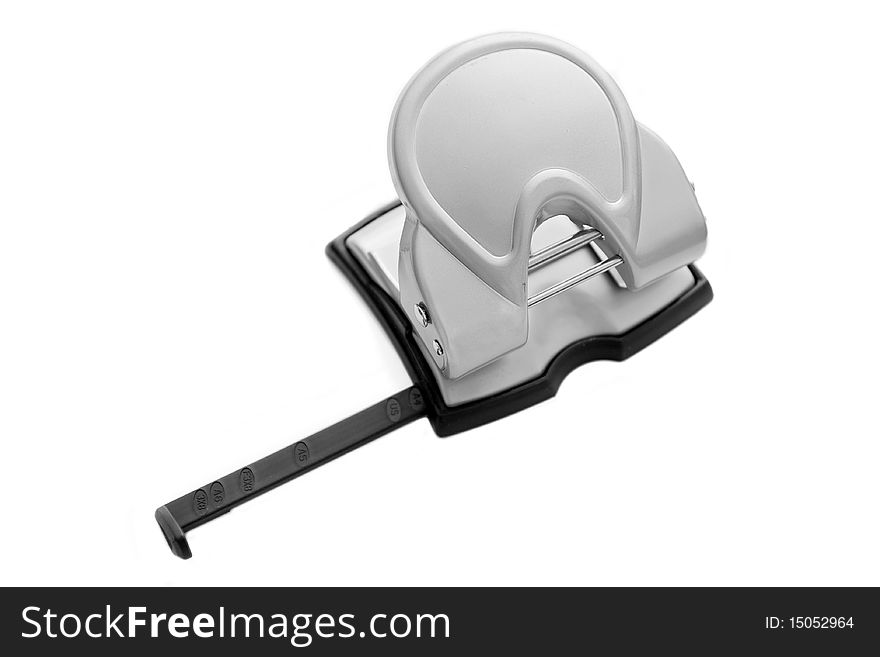 Silver office keypunch isolated on white background