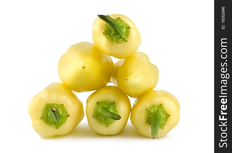 Ripe yellow peppers isolated on a white background