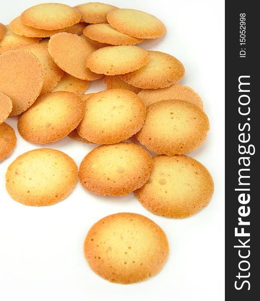 Close up of a pile of biscuits on white