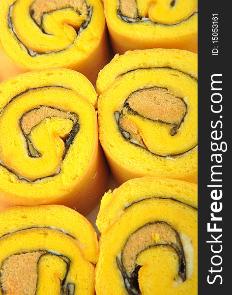 Close-up fresh roll cake background. Close-up fresh roll cake background