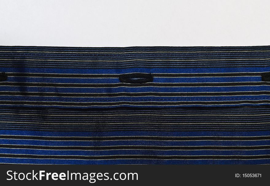 Blue striped fabric texture with buttonhole. Blue striped fabric texture with buttonhole.
