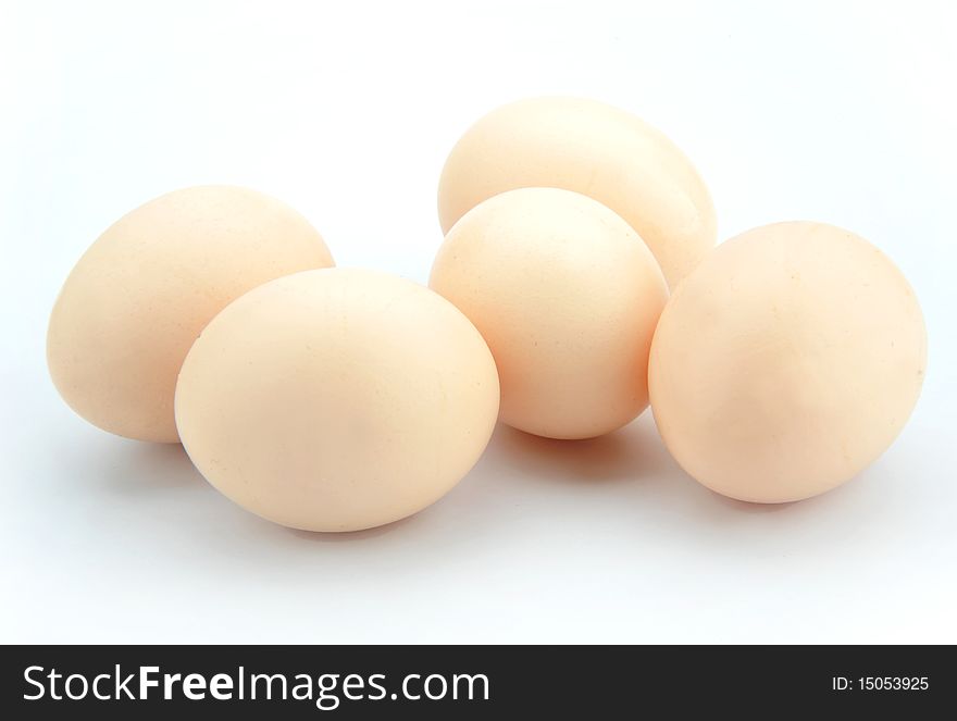 Organic eggs on a white background