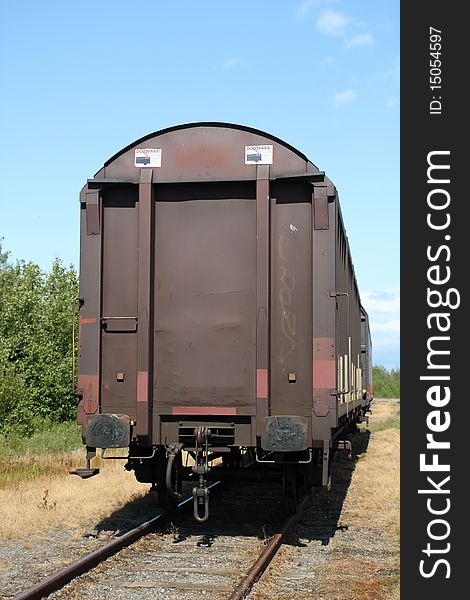 Old freight car standing in railyard