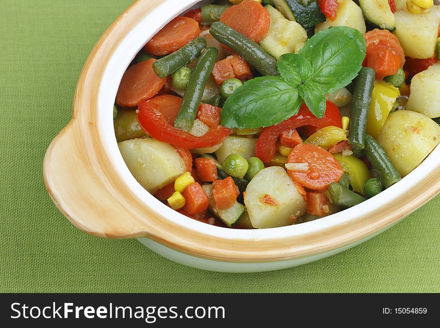 Fried vegetables in a ceramic bowl.