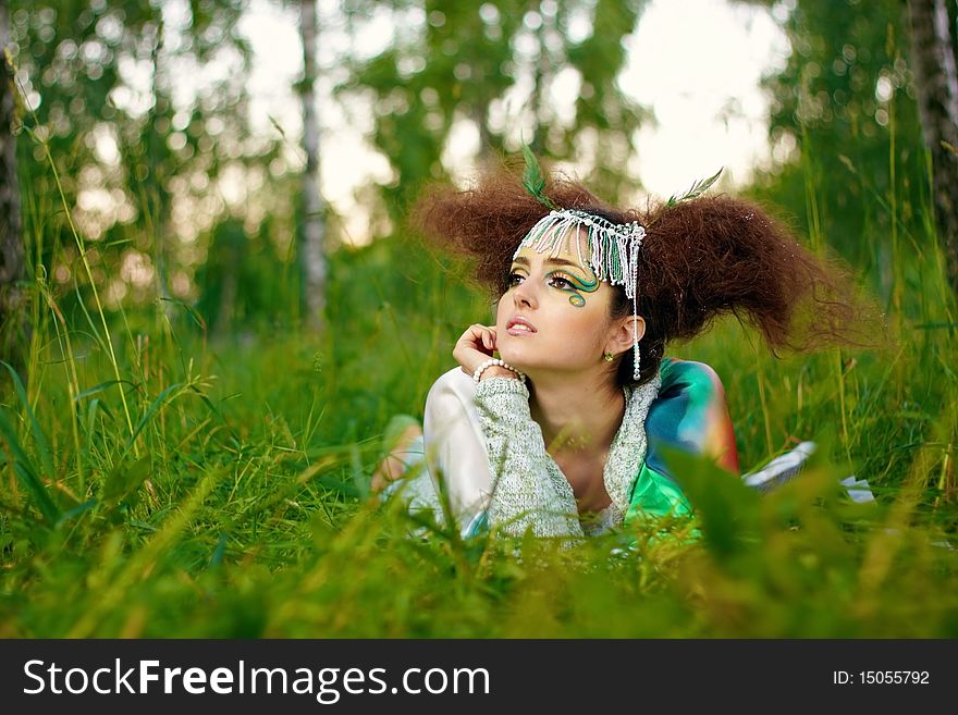 Young girl in forest, fantasy make-up. Young girl in forest, fantasy make-up