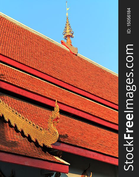 Ornate buddhist decorations on roof of Wat Pho temple in Bangkok.Thailand. Ornate buddhist decorations on roof of Wat Pho temple in Bangkok.Thailand