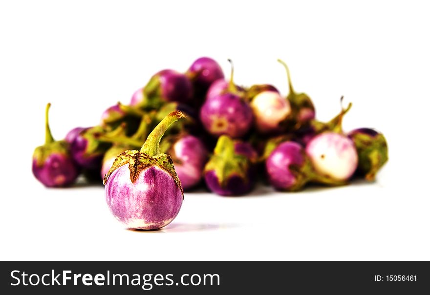 Group of small Egg-plants. Aubergine. Isolated over white.