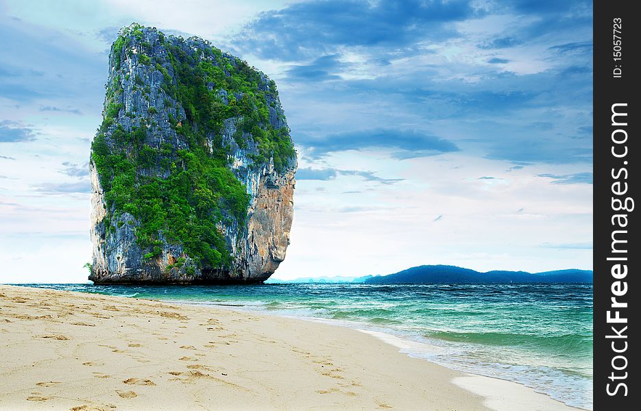 High cliff on Poda island. Exotic tropical landscape. High cliff on Poda island. Exotic tropical landscape.