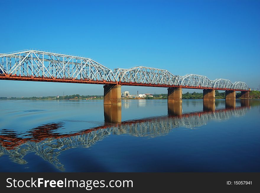 Railway bridge through the river