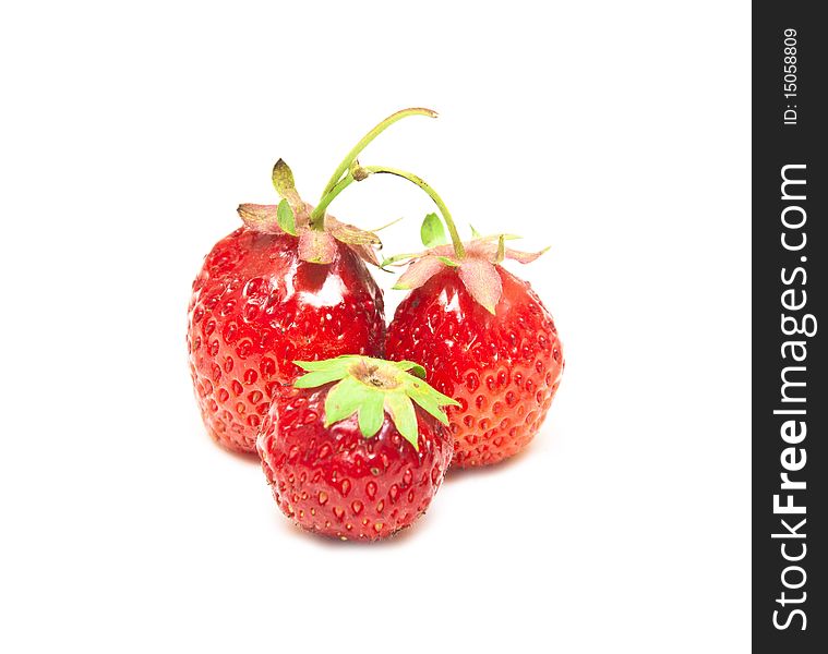 Fruits of red strawberry isolated on white background