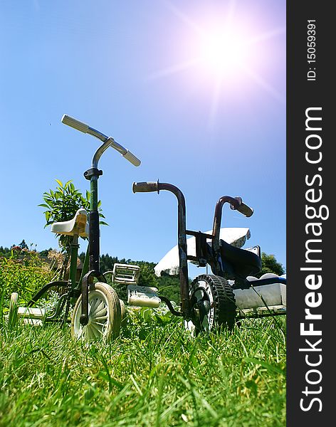 Children's tricycle in the garden. Children's tricycle in the garden