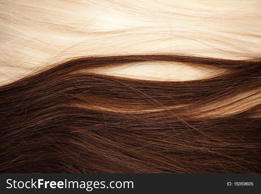 Background of brown and blond hair. Background of brown and blond hair
