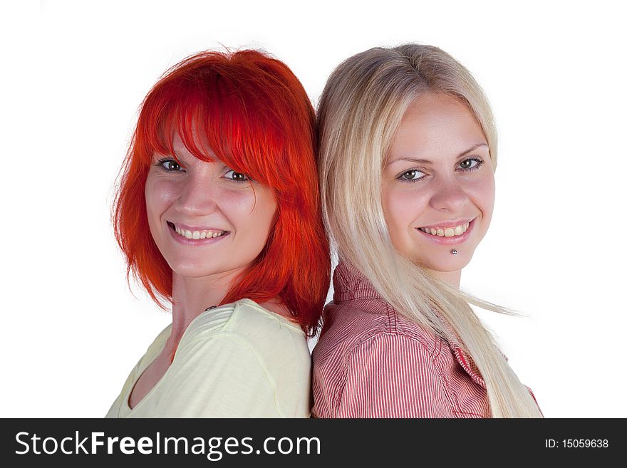 Two ladies posing on a white background. Two ladies posing on a white background