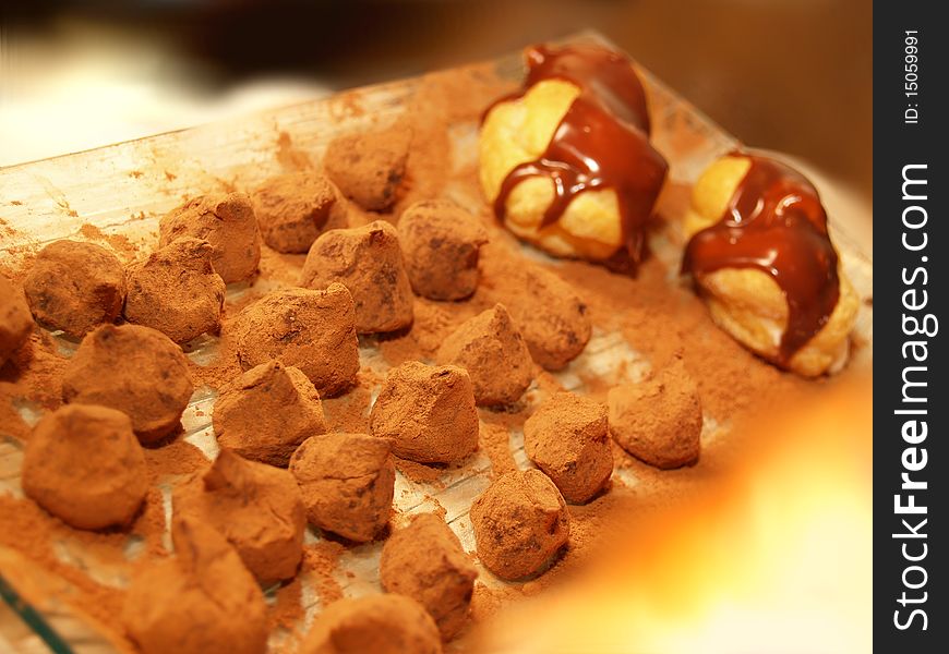 Plate of Chocolate Truffles and eclaire