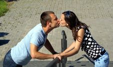 Boy And Girl Kissing Stock Photo