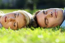 Sleeping Couple In The Park Stock Images