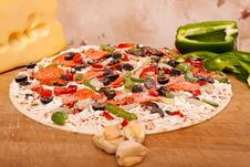 Raw Pizza With Vegetables And Pepperoni Stock Images