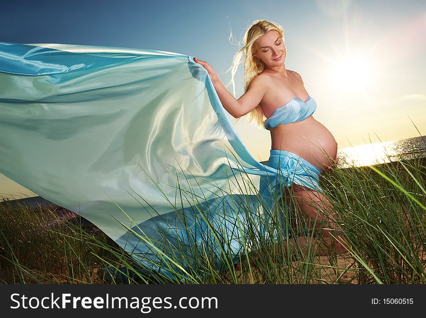 Picture of a Beautiful pregnant woman outdoors