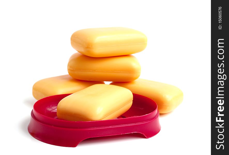 Yellow soap on a white background