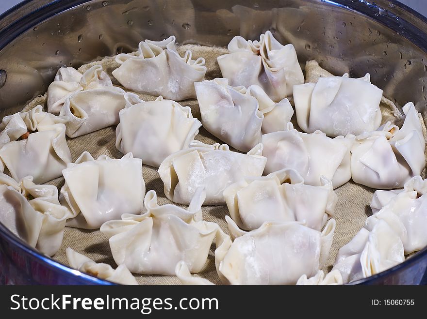 Close up shot of dumplings during prepare process