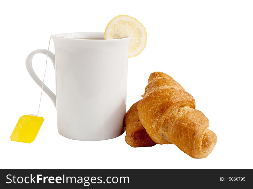 Croissants and tea on a white background