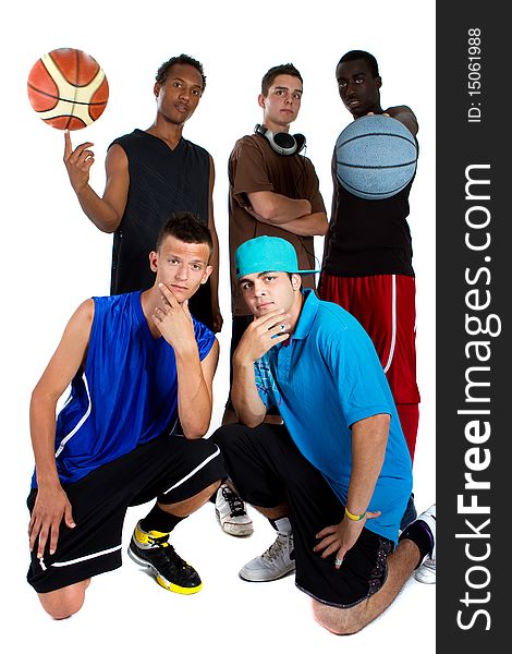 Group of young interracial men posing as a basketball team. Very hip, young and fresh crowd. Group of young interracial men posing as a basketball team. Very hip, young and fresh crowd.