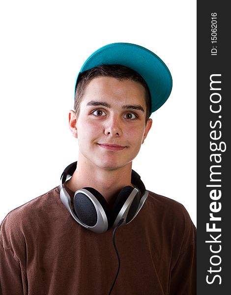 Young fresh teenager with headphones isolated over a white background. Young fresh teenager with headphones isolated over a white background.