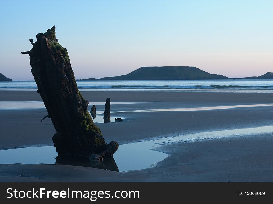 Early morning sunrise over a calm ocean in the summertime. Early morning sunrise over a calm ocean in the summertime