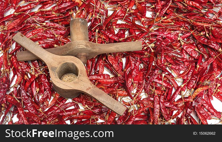 Sri Lanka Red Chillies with string hoppers maker on the board for dry