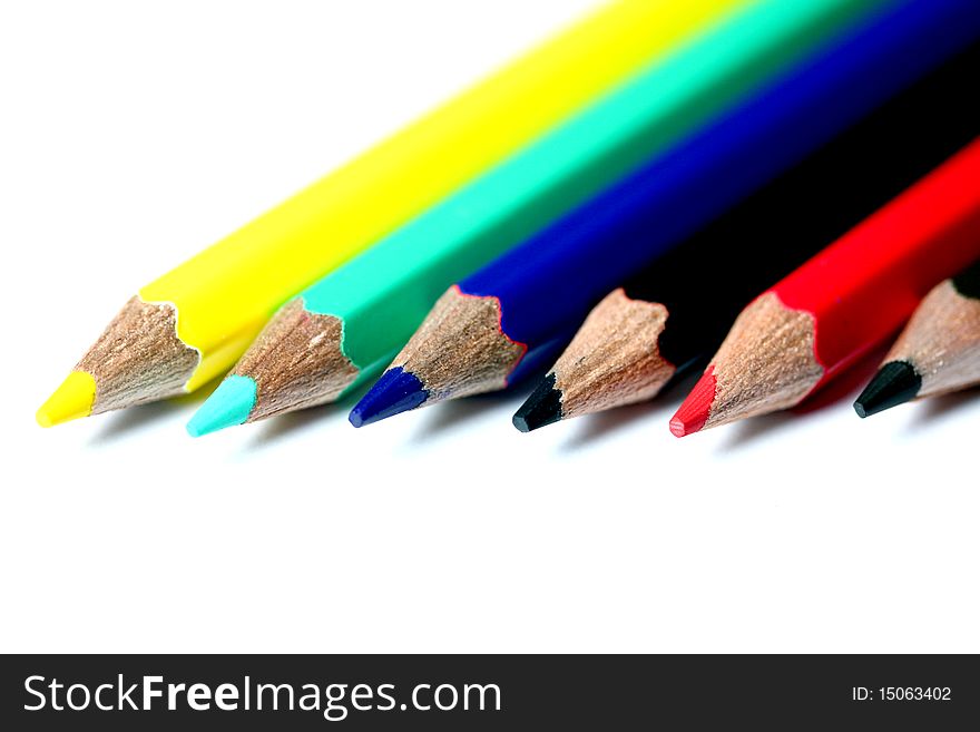 White background with colorfull pencils