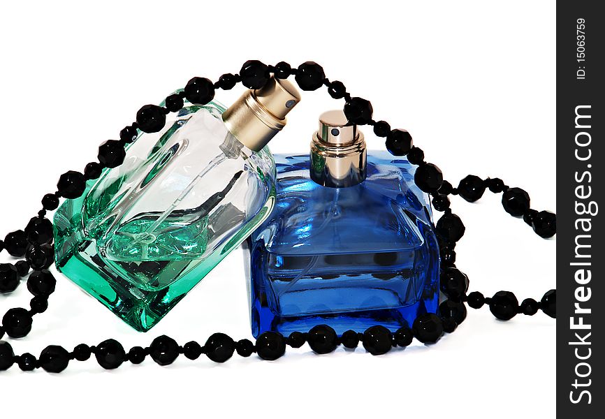 Two Pulverizers With Perfume And Black Necklace