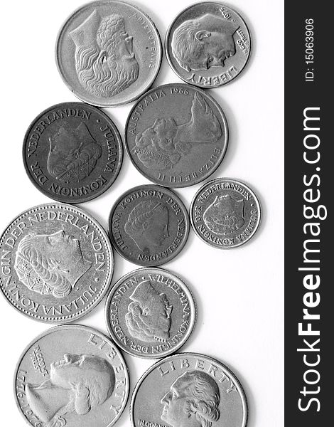 Different metal silver coins over white