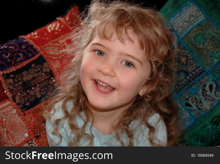 Three year old girl with curly blond hair. Three year old girl with curly blond hair